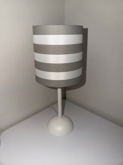 White and grey small lamp