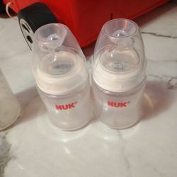 Set Of Two NUK Bottles