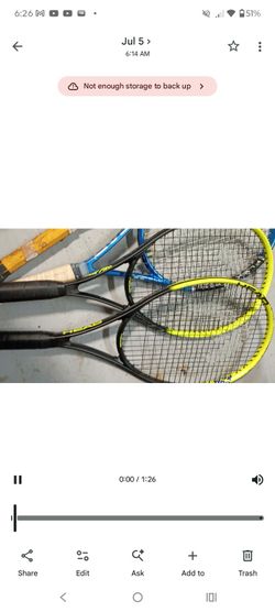 4 tennis rackets and a bag to carry them
