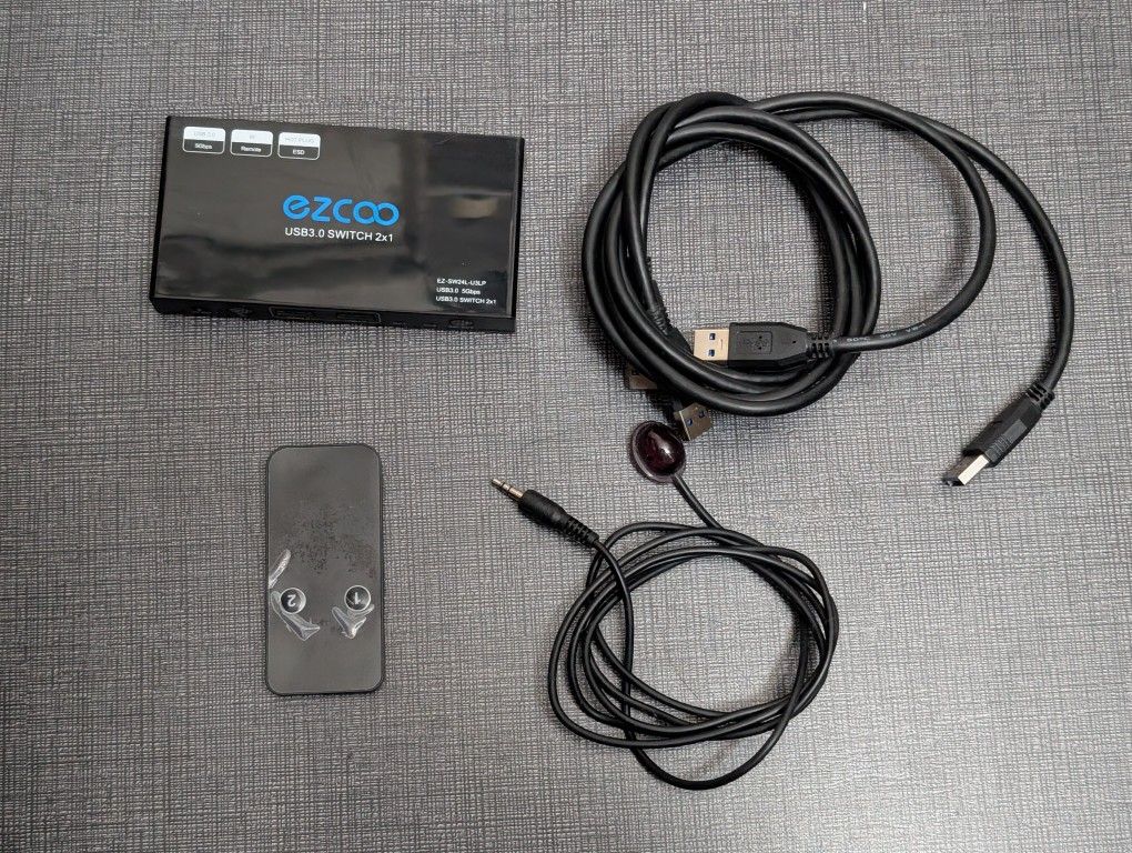 USB 3.0 Switch Selector for 2 Computers Sharing 4 USB Devices with One-Button Swap and 5Gbps Speed