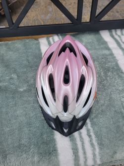 pink and white Avenir bicycle helmet