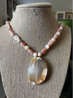 Mother of Pearl, Agate Pendant and Sterling Chain Necklace. Available in Coral Gables. Cash please.