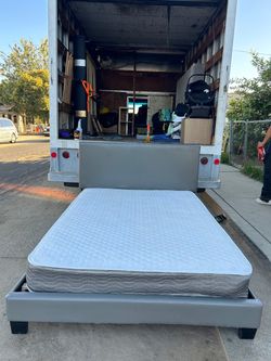 Full-size bed frame with mattress