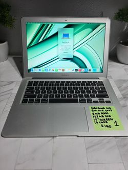 TEAL MacBook Air 13-inch, 2015 model with Intel Core i5, 8GB RAM, and 128GB SSD. Silver aluminum body with a full keyboard and trackpad. Powers on and