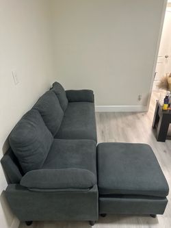 Dark Gray Sectional Sofa with Reversible Ottoman