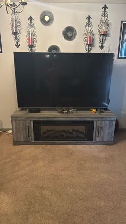 75in LG Smart TV and fireplace