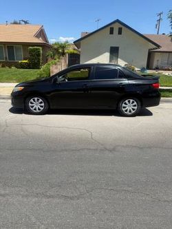 Clean 2016 Toyota Corolla Le sport sedan