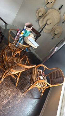 Rattan table and two chairs