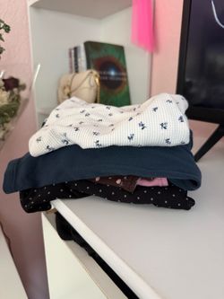 bundle of 4 xs small shirts