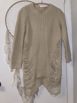 Woman’s Distressed Sweater Dress