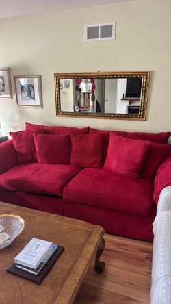 Beautiful red sofa and cushions