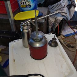 Antique oil cans and gauges
