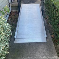Wheelchair Ramp Still Available, In New Condition. Aluminum, Will Not Rust, Will Take Up To 700 Pounds.