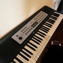 Yamaha 61-Key Portable Keyboard for Beginners with Built-In Songs, Quiz Mode, Music Rest, with Power Adapter YPT280