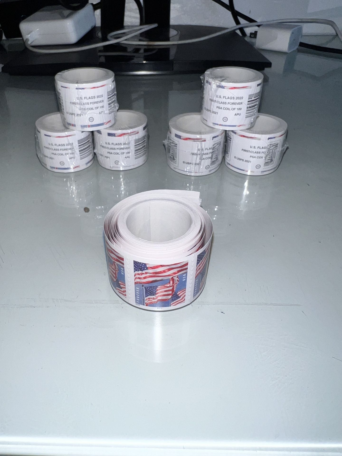 First-class forever USPS postal mail stamps (1 roll = 100stamps) (I have 7 rolls available)