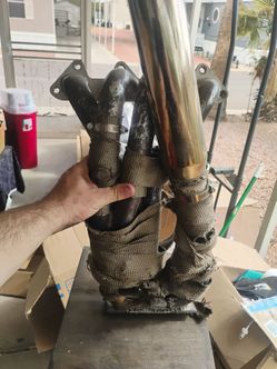 Homemade Hood exit header for a f series motor of a Honda