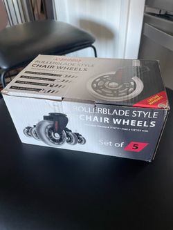 Rollerblade style chair wheels protect floor; no mat needed