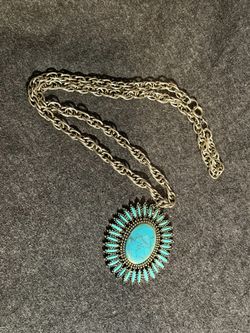 Turquoise Pendant Necklace with Silver Sunburst Design