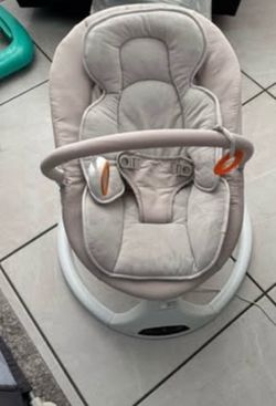 Electric baby swing