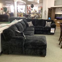 Black sectional with Chase