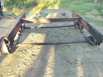 Two axles ready to install. 7000 pounds.  Electric brakes away arms