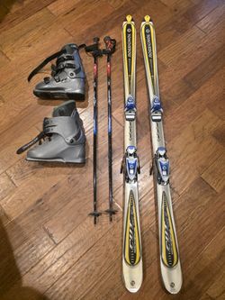 Rossignol Skies And Poles With Boots 9.5