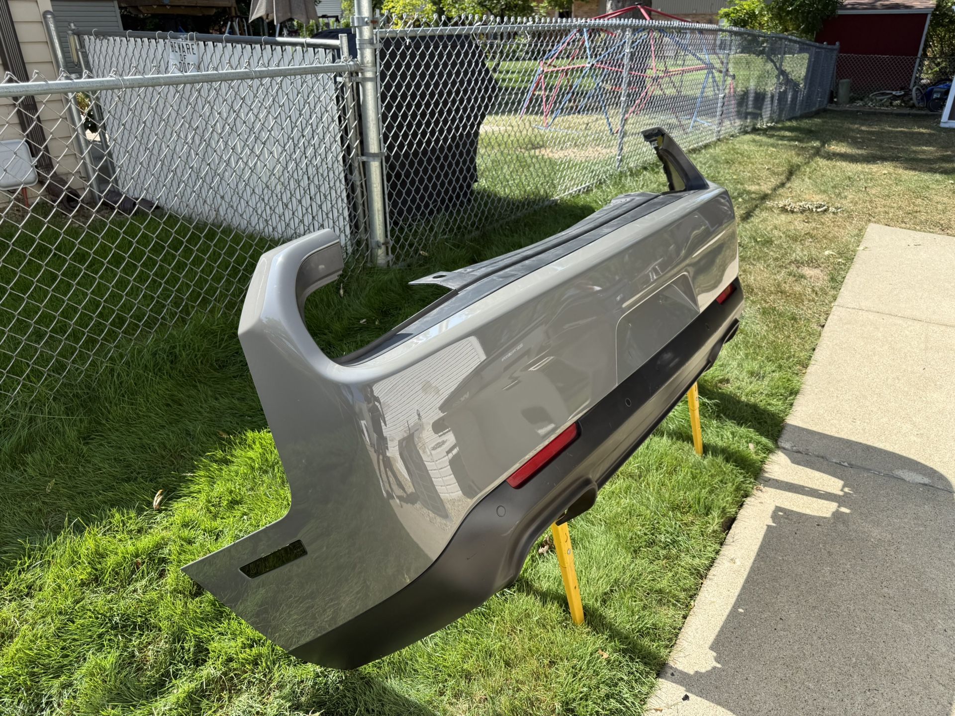 2015 –2023 Dodge Challenger Rear OEM Bumper with sensors (GREY)