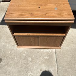 Brown Entertainment Center/Storage Cabient
