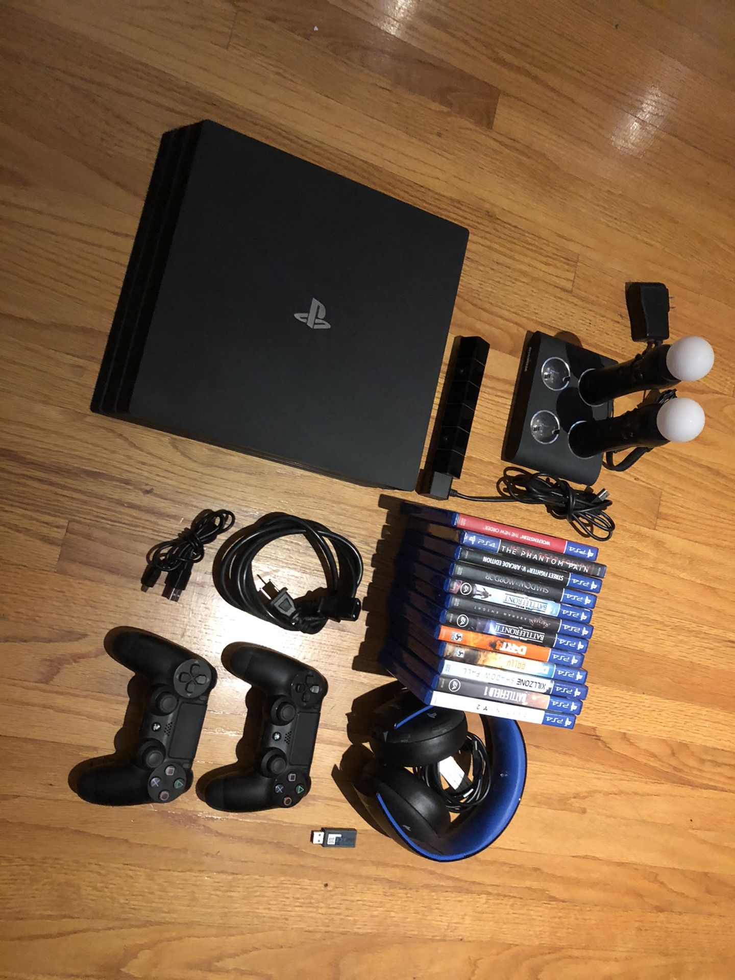 PS4 Pro + Controllers + BT Sony Headphones + Games + Move + Camera