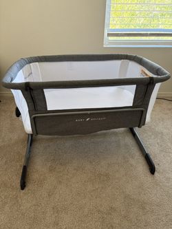 Bassinet. Brand: Baby Delight. Color: Gray and White.