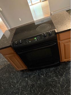 Black Electric Range oven with Glass stovetop with granite tops