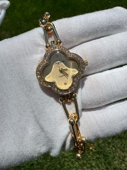 Womans Golden Clover watch $35