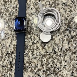Brand New Apple Watch Series 9 GPS + Cellular Unlocked 41mm. Stainless Steel. Silver. Storm Blue M/L Band And Charger 