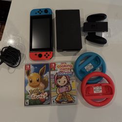 Nintendo Switch with dock/charger/wheels (can buy without games)