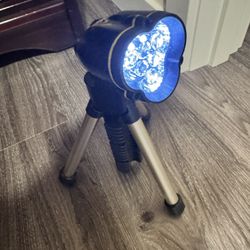 LED flashlight with tripod