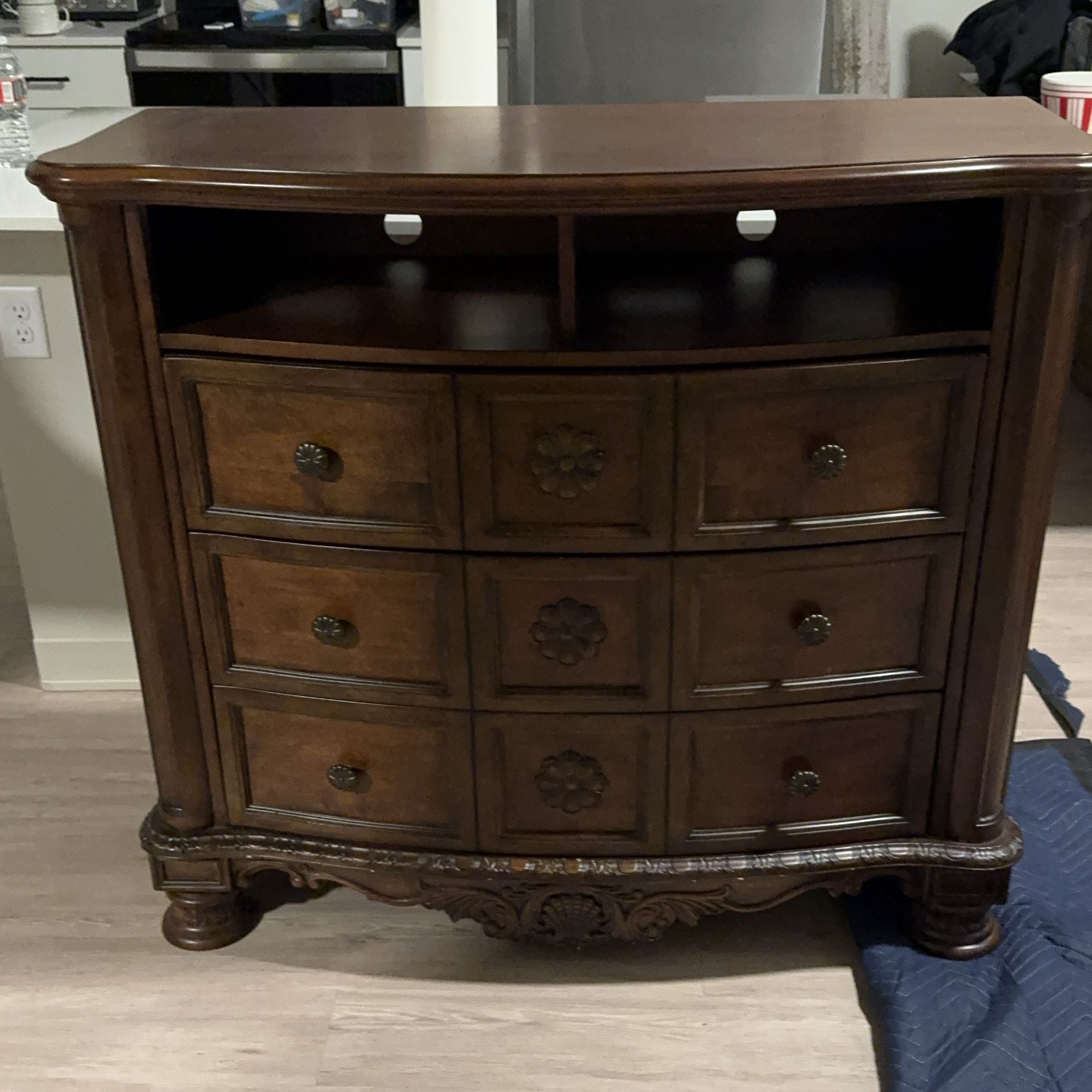 Brown Wooden Media Console with Carved Details