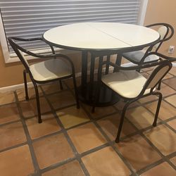 Table with extender and chairs