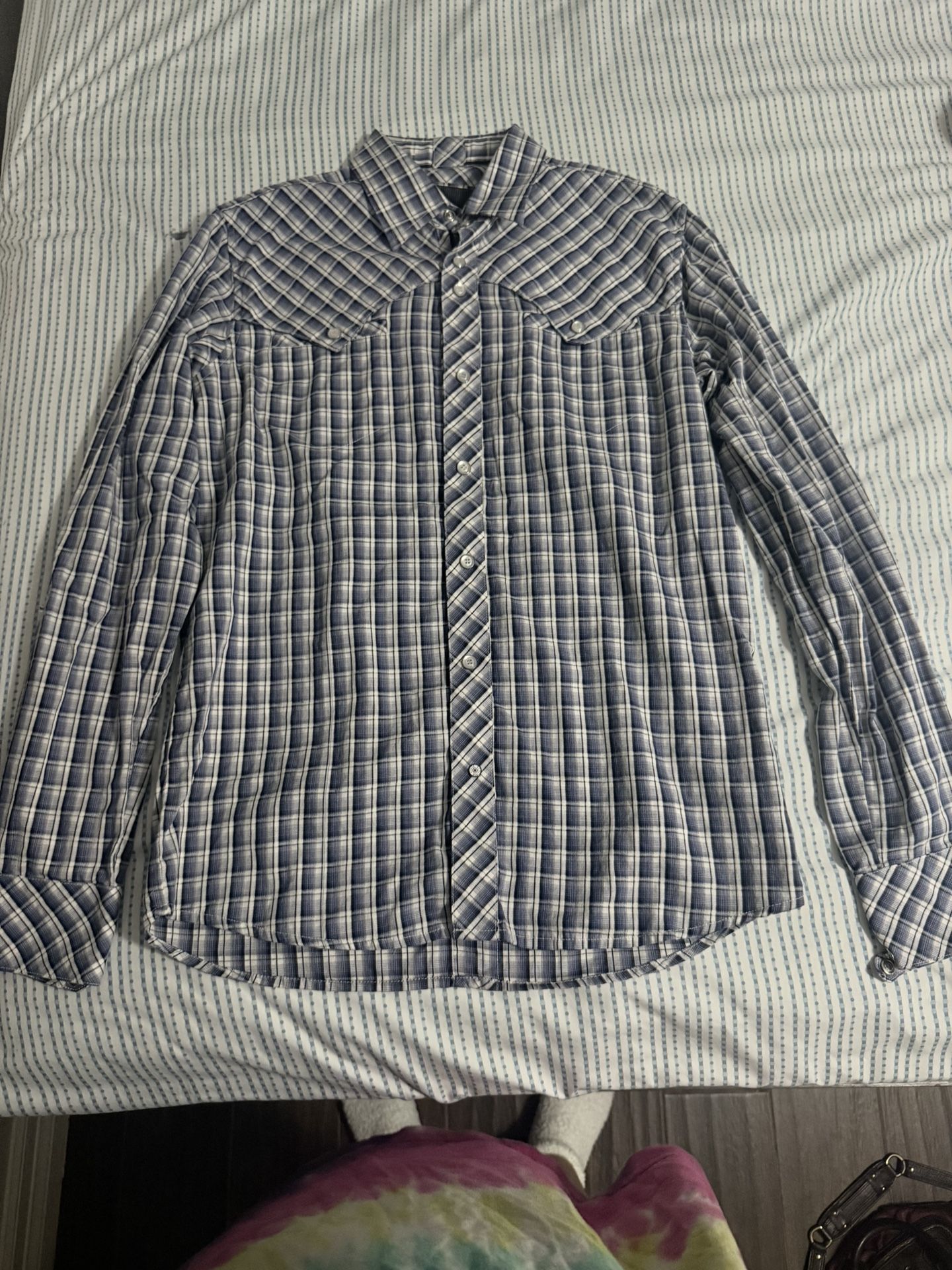 Blue and white plaid button-up shirt
