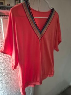 NEW Coral V-Neck Top with Trim Detail!