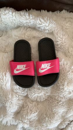 Girls pink and black Nike sandals