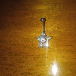 Belly button ring. Star shape.