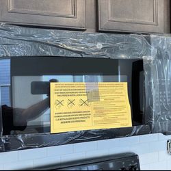 New Out Of Box GE Microwave / Microondas GE