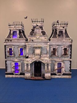 Vintage fisher price haunted dollhouse display