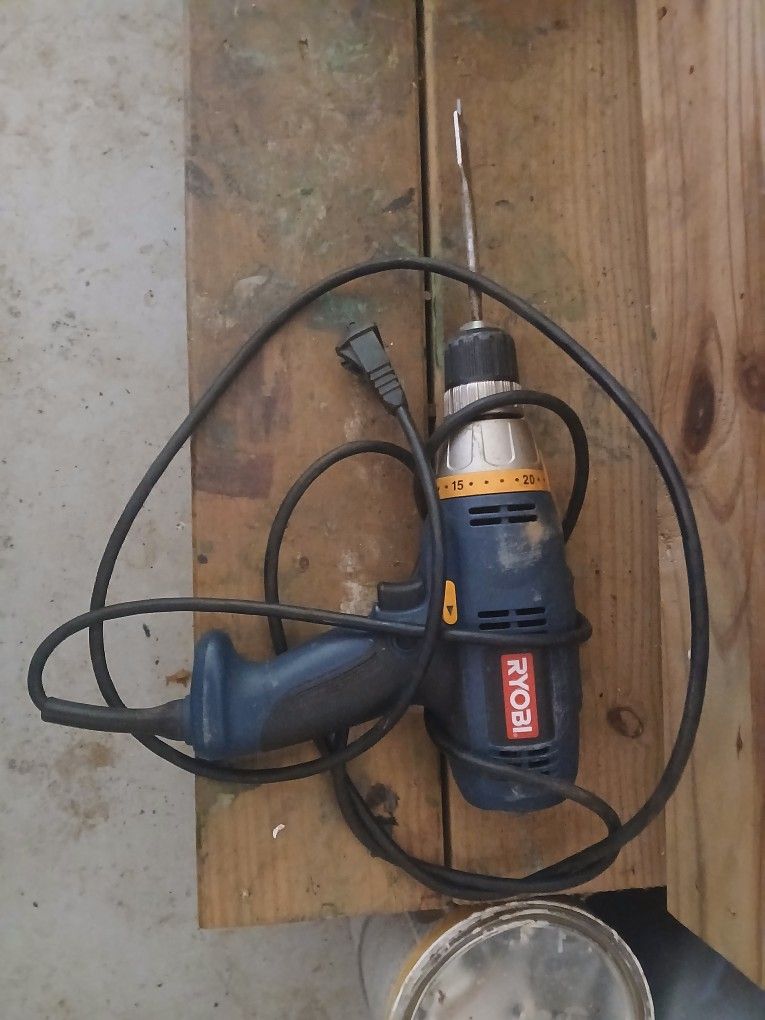 Green Ryobi Powerdrill Corded with 1 drill bit