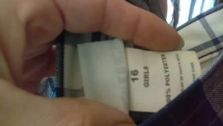 Three uniform skirts two size 14 one size 16