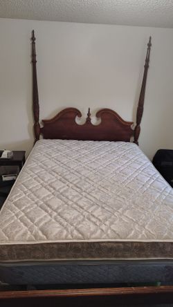 Queen size bed. Includes frame, mattress, and box spring.
