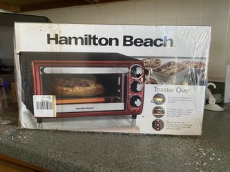 Hamilton Beach Red - 4-slice toaster oven (model 31146J).