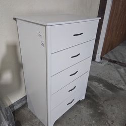 WOOD DRESSER WITH 5 DRAWERS COLOR WHITE STILL IN GOOD CONDITION NICE AND CLEAN IF SOMEONE INTERESTED PLEASE TEXT ME PLEASE 