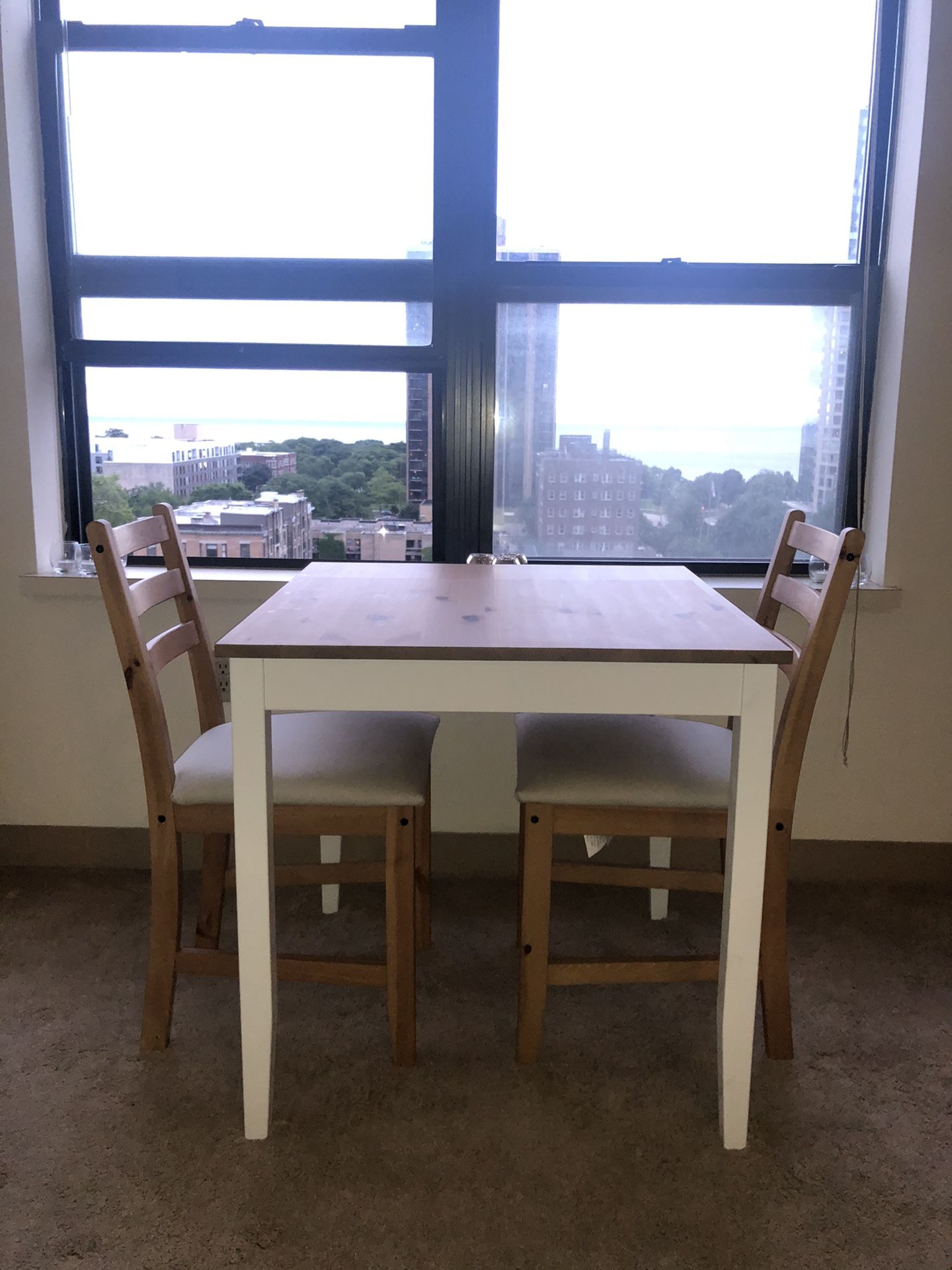 Dining table and two chairs