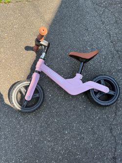 Small pink balance bike